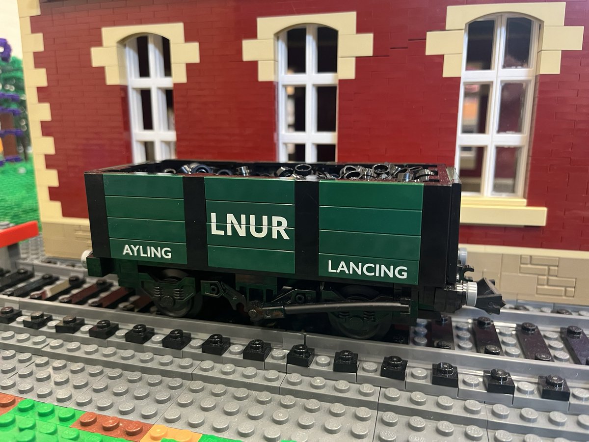 LNURailway's tweet photo. A selection of wagons from Member Weekend - including Andrew’s award winning iron ore hopper wagon #lego #legotrains #lgauge https://t.co/ZgZY3W1ARR