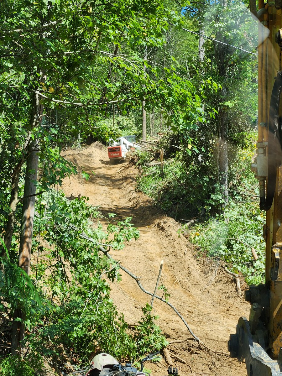 voldog19's tweet photo. This is what me &amp; my kiddo has been doing for the past 3 days. Clearing 2.5 acres I gave him. I  run the excavator and he runs the skid steer. Working daylight to dark wirh our normal jobs in between. Proud of the man he has be come. Instill hard work in kids when they're young. https://t.co/2mqpcAVWea