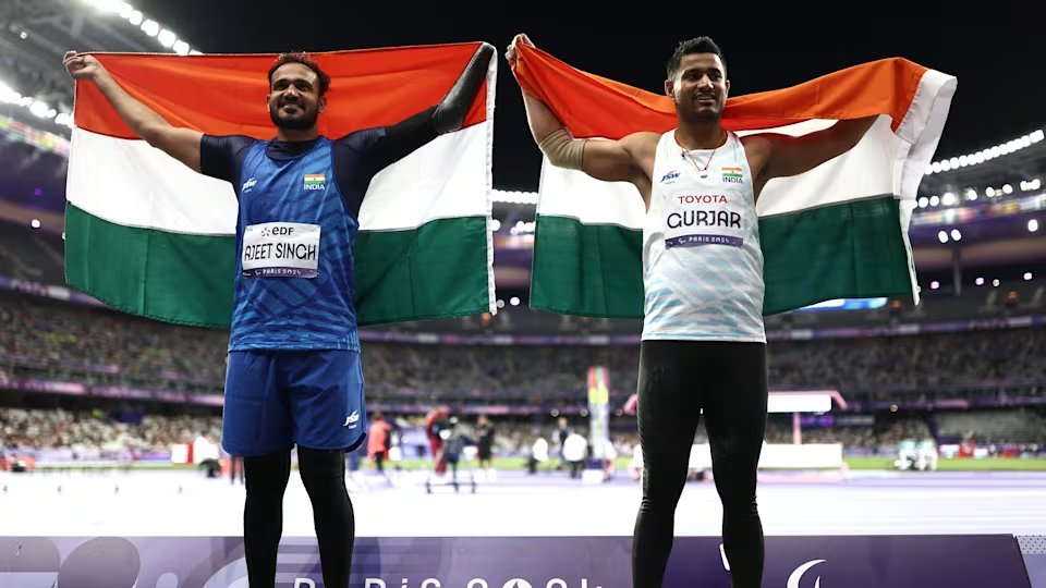 Anandzork's tweet photo. India’s medal tally at #Paralympics2024 just hit 20! With 3 gold, 7 silver, and 10 bronze, our athletes are making history. This is the highest medal count ever, surpassing the 19 medals from the last Paralympics. The spirit of India shines bright! #IndiaForGold #ProudMoment #Cheer4Bharat

Highlights:
🥈 Ajeet Singh won a silver medal with a throw of 65.62m in the F46 class.
🥉 Sundar Singh Gurjar clinched bronze with a throw of 64.96m.