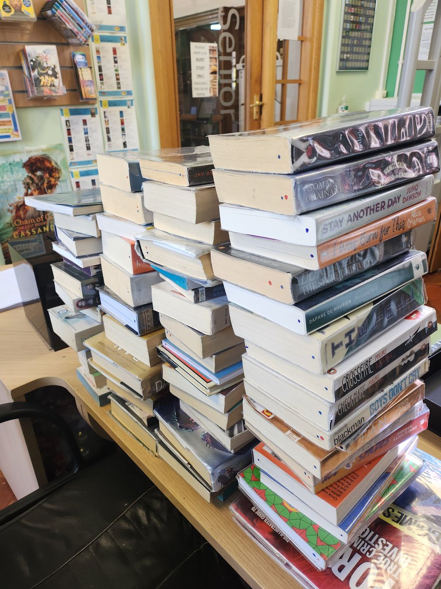 KEHSlibrary's tweet photo. With a mountain of returns school as begun once more! Welcome back everyone - the Library is open! #firstdayback #libraryreturns #summerreading https://t.co/wL081A0fsj
