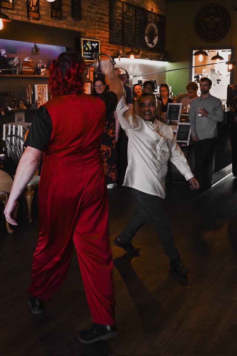 QuoiGender's tweet photo. For legal reasons, this was not a wedding. Just an excuse to dance with swords, kiss a bunch, and have a party. https://t.co/gkSvN5at2L