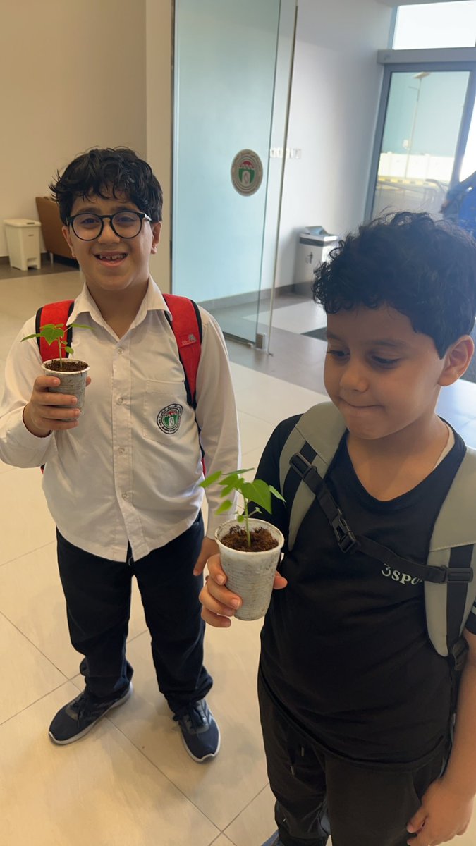 "Sharing the sweetness of our papaya trees with our school family, spreading green joy one fruit at a time! 🌳🎁 #GreenhouseBounty