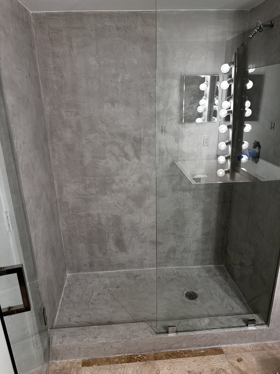 KoncreteArt's tweet photo. Looking for a way to avoid demo but still update your bathroom? Look no further! These concrete wall overlays are applied right over tile and eliminate the need for grout joints, making it easier and quicker to clean! https://t.co/arlAAxDvB8