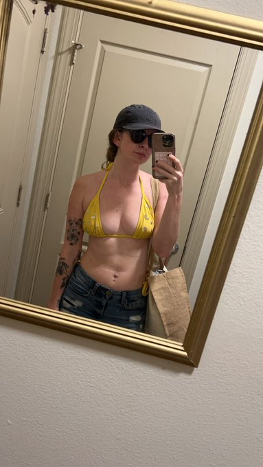 Sitting out by the pool and editing some videos today 😎 should I send out a solo video on my onlyfans