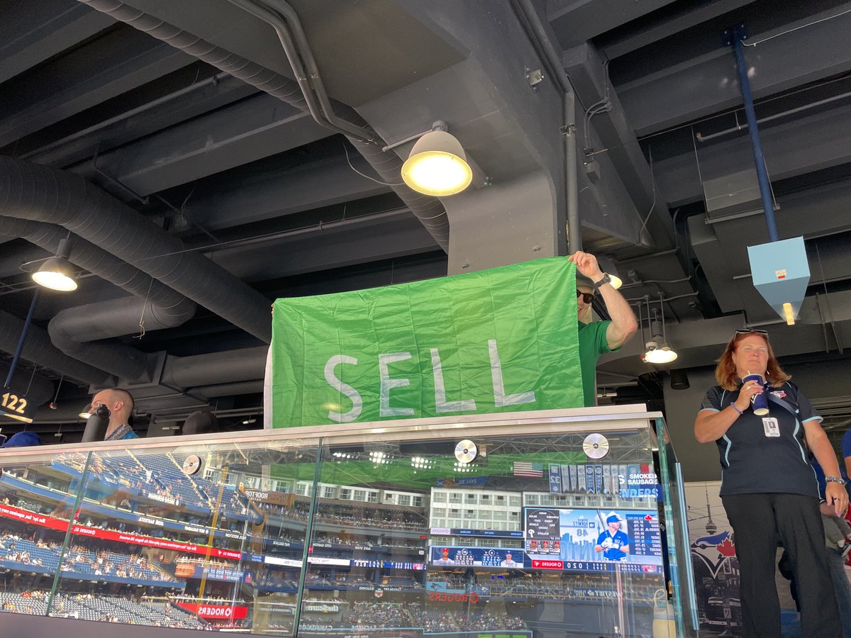 Not the first sell flag ⁦<a href="/BlueJays/">Toronto Blue Jays</a>⁩ game but hoping first to wear anti fisher shirt there.  ⁦<a href="/LastDiveBar/">Last Dive Bar 🏟</a>⁩ ⁦<a href="/Oaklandish/">Oaklandish</a>⁩