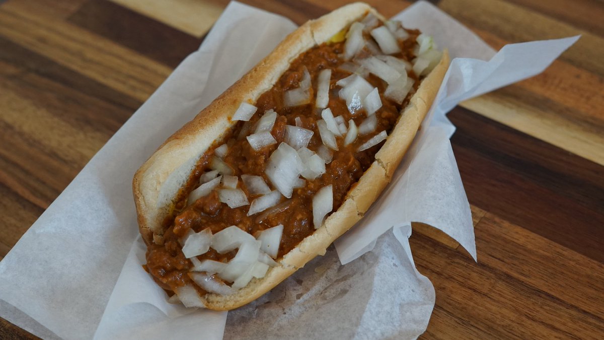 Today's Chili Dog Haiku

Tasty treat unfolds, 
Chili drips, bun holds the mess, 
Summer bite, pure bliss.