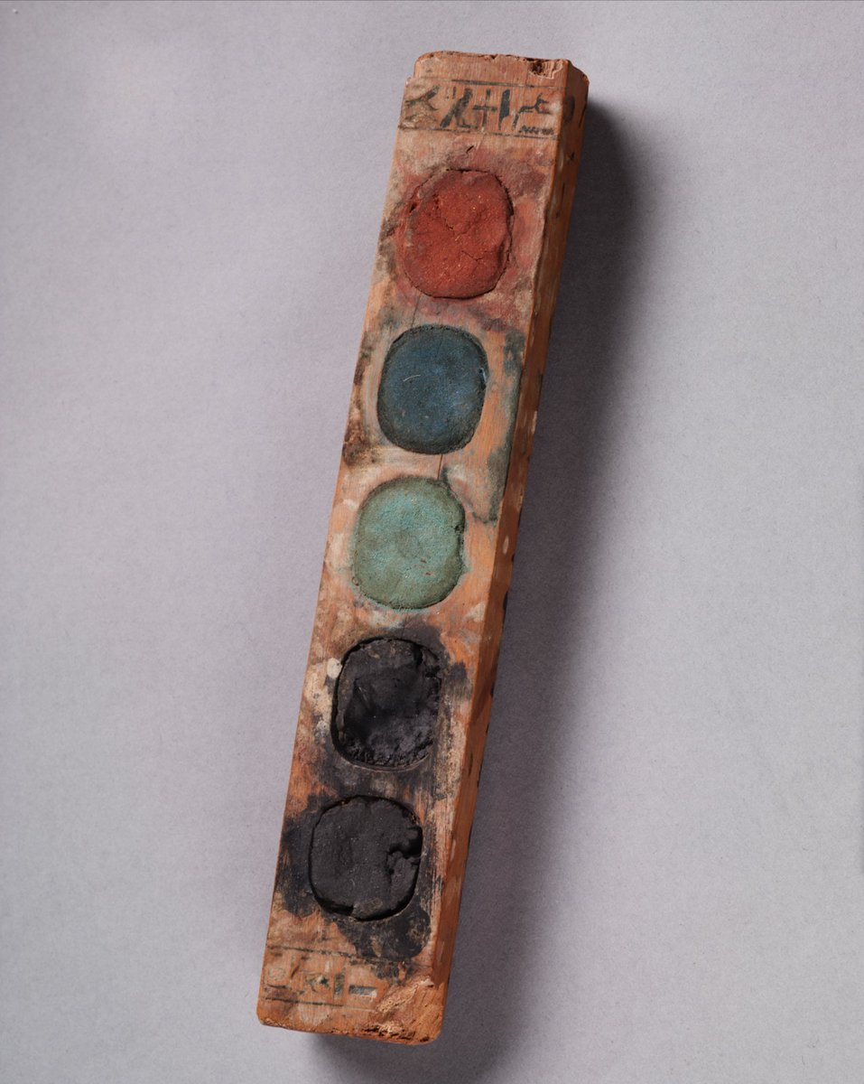 Wow, a 3,400 year-old ancient Egyptian paint box containing its original pigments!

(Looks similar to a modern-day set!)

The preserved cake pigments are red (red ochre), blue (Egyptian blue), green (a mixture of Egyptian blue, yellow ochre, and orpiment) and two of black (carbon