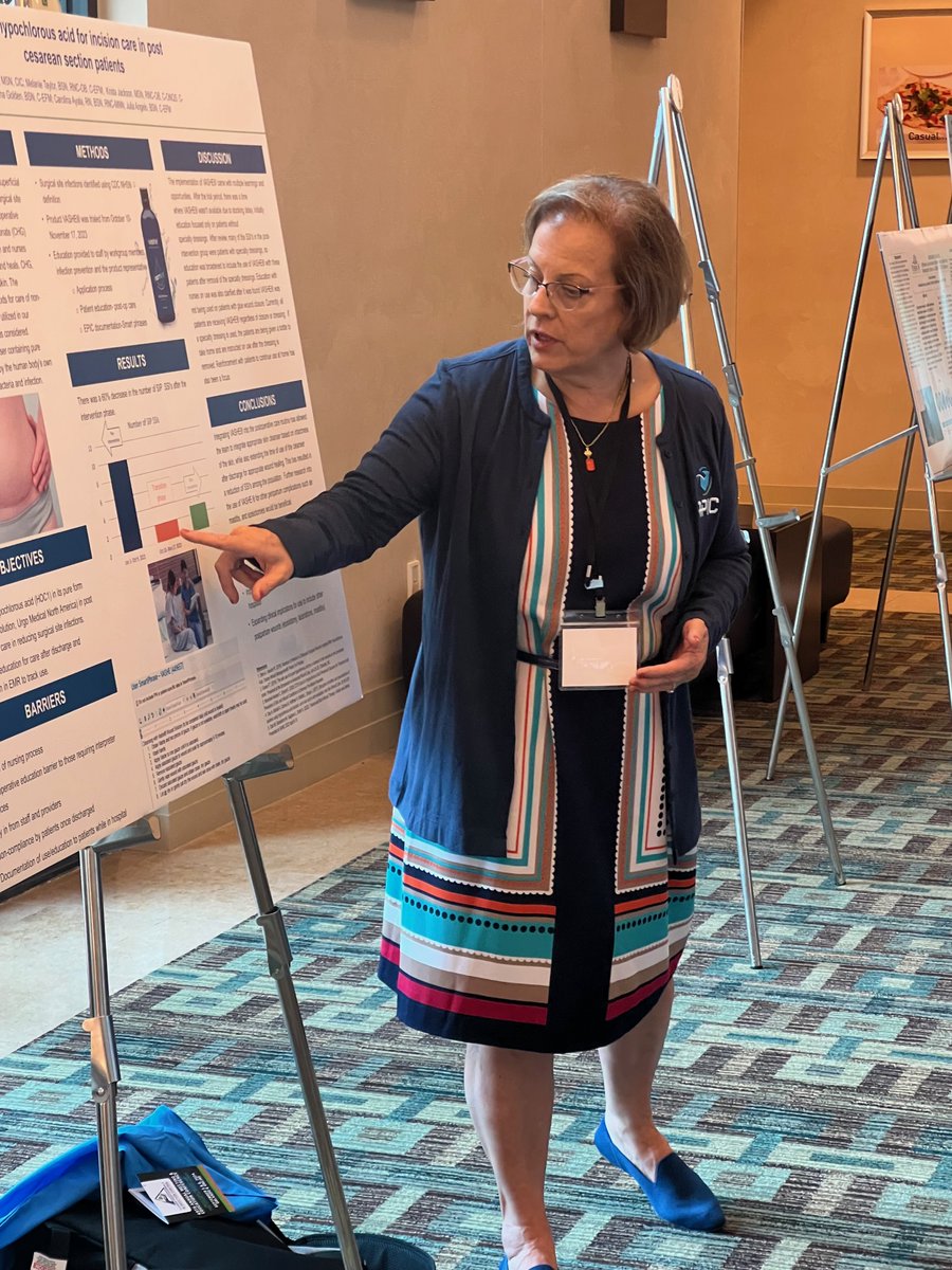 I'm back with another non-academic Mom In Science update: she's with her poster at another conference, this time invited! She's thinking about writing it up as a manuscript; that would be so awesome.