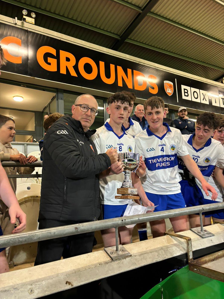 Armagh_GAA's tweet photo. Comhghairdeas to Dromintee  on their success in winning the U16 Div 1 Championship trophy. 

Presentation made to the winning captain Jarlath O'Neill by Armagh Youth Secretary Daithí O'Brien. 

Well done to St Patrick's Cullyhanna in reaching this evenings final.

Thank you to the BOX-IT Athletic grounds for hosting, Armagh TV for their excellent coverage and to the Armagh Youth Board for all their hard work in organising our games. 

Special mention to referee Neil McGeown alongside all his match officials. 

Maith sibh go léir !