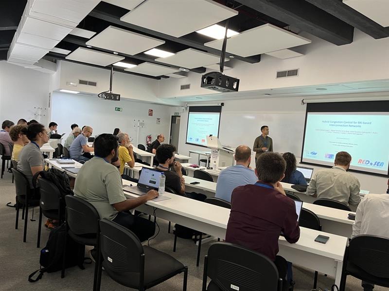 Raap (Redes y Arquitecturas de Altas Prestaciones) (@raapi3a) on Twitter photo On August 26th, our PhD student <a href="/gabrielgl8/">Gabriel Gómez López</a> presented the paper “Hybrid Congestion Control for BXI-Based Interconnection Networks” at the Euro-PAR congress. This work derives from the participation in the @Redsea_EU project. On August 26th, our PhD student <a href="/gabrielgl8/">Gabriel Gómez López</a> presented the paper “Hybrid Congestion Control for BXI-Based Interconnection Networks” at the Euro-PAR congress. This work derives from the participation in the @Redsea_EU project.