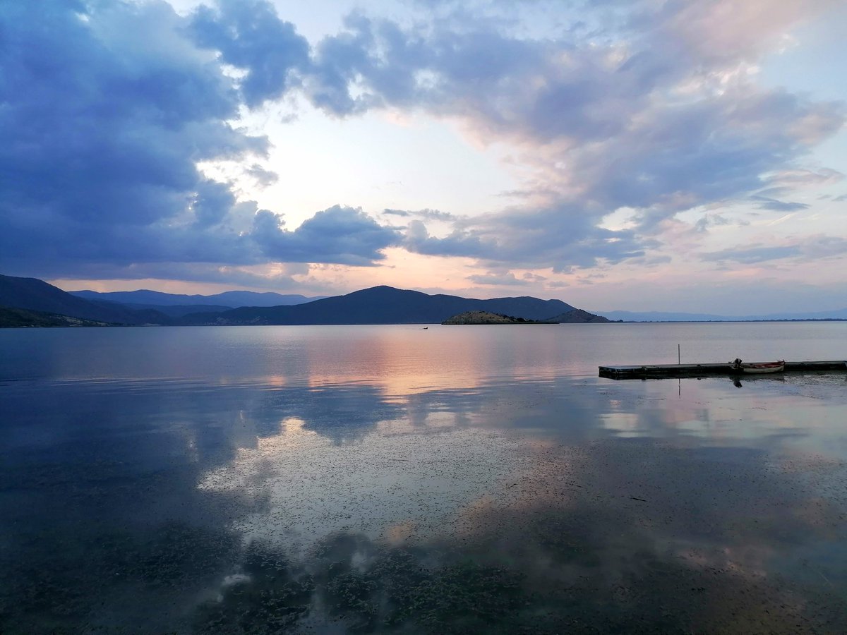JulianHoffman's tweet photo. These end-of-summer evenings of shadow and light over Lesser Prespa Lake. https://t.co/vGH1sKoFNw
