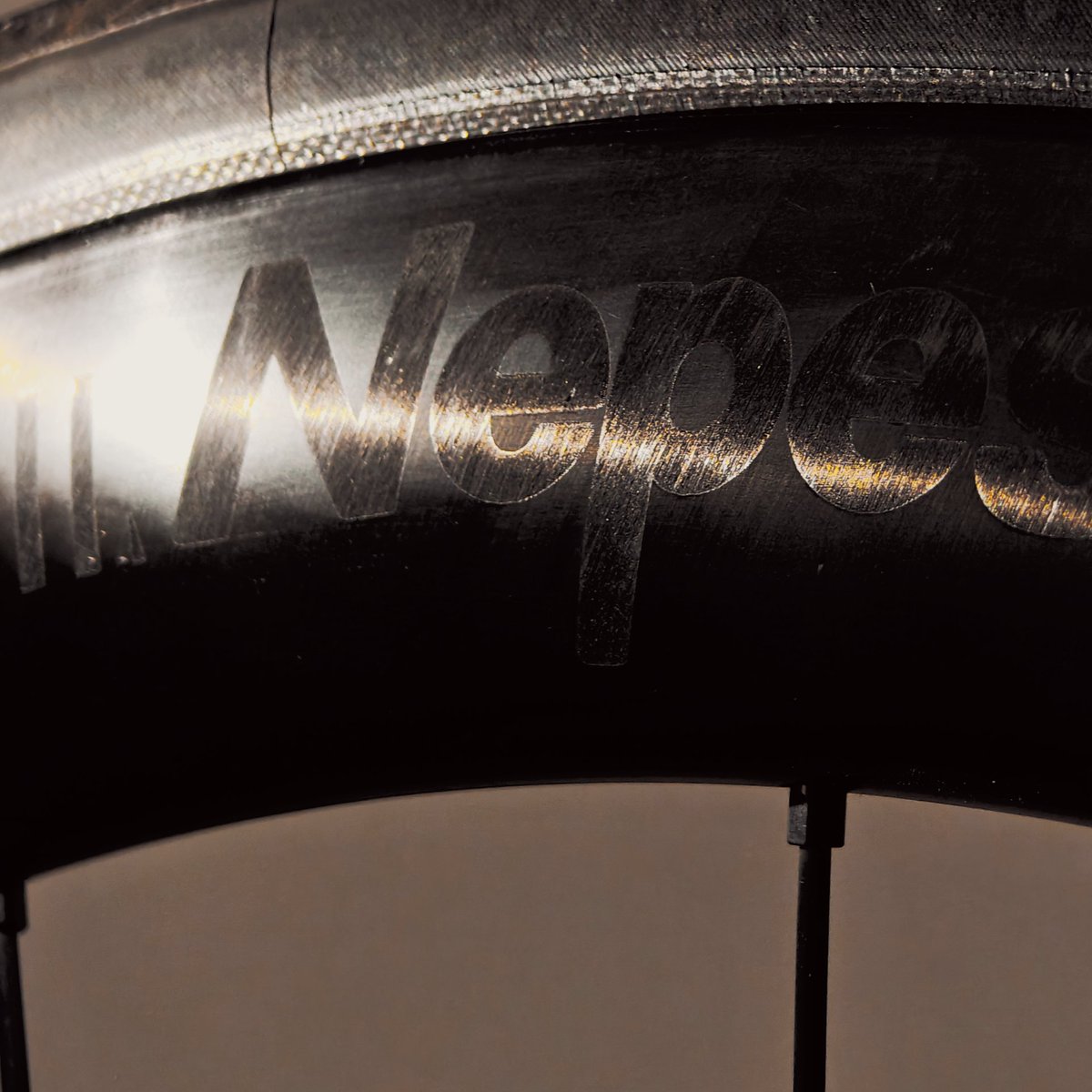 Nepestworld's tweet photo. The marks carved into the carbon fiber surface are a testament to the time spent with the rider #nepest #roadbike #wheelsets https://t.co/Wjby5o3ZOH