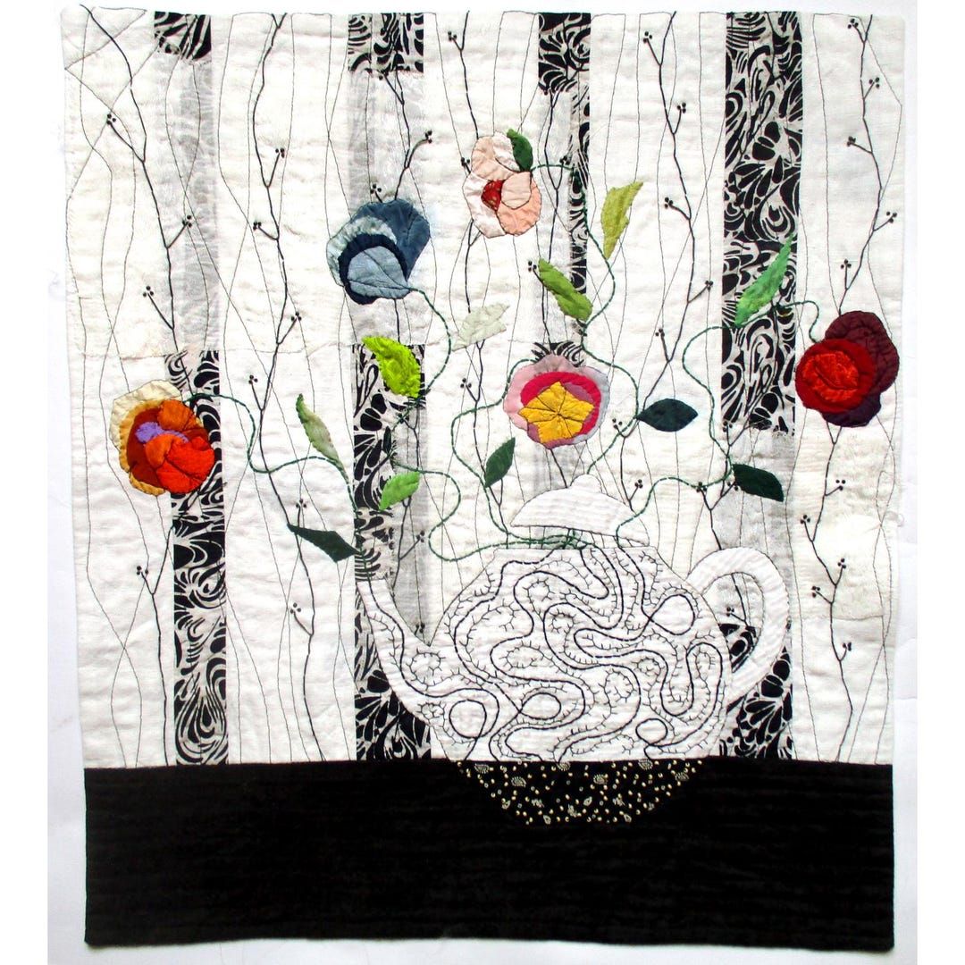 Adorn your space with a charming art quilt featuring a teapot and flowers, perfect as a wall hanging. Embrace the cozy cottagecore vibes. 🌿🌸  buff.ly/3TFqatN #cottagecore