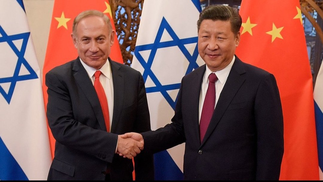 Doğu Türkistan'da soykırım...
İki soykırımcı yan yana.