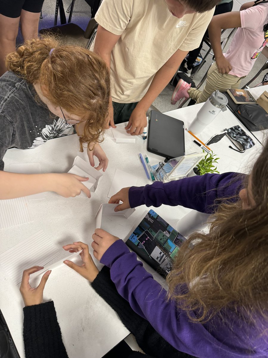 Team challenge: building a bridge with index cards strong enough to hold a book!📚 <a href="/GoodrichSchool/">Goodrich School</a>