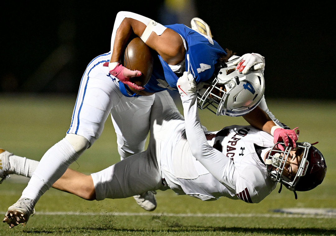 Alta Loma wide receiver Santiago Vasquez (21) catches a deflected pass for the only touchdown of the game during the first quarter against visiting Claremont  Friday, Sep. 20, 2024. Alta Loma defeated Claremont 7-3. @AltaLomaBraves @altalomahigh
