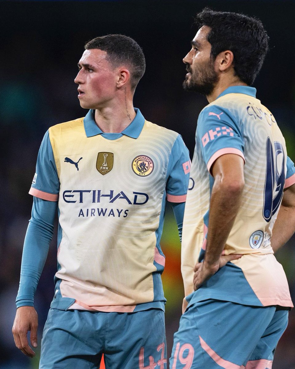 Manchester City teams debut their new fourth kit in the Champions