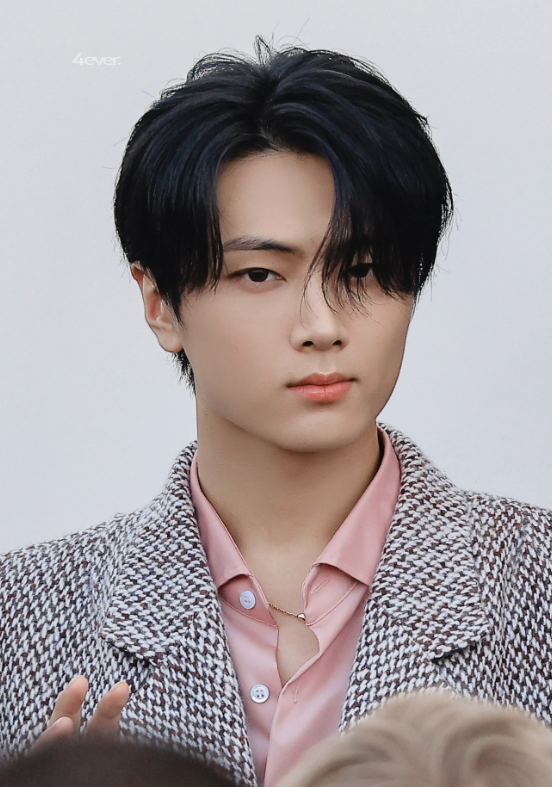 ENHYPEN's Jay serves face at the Prada show.