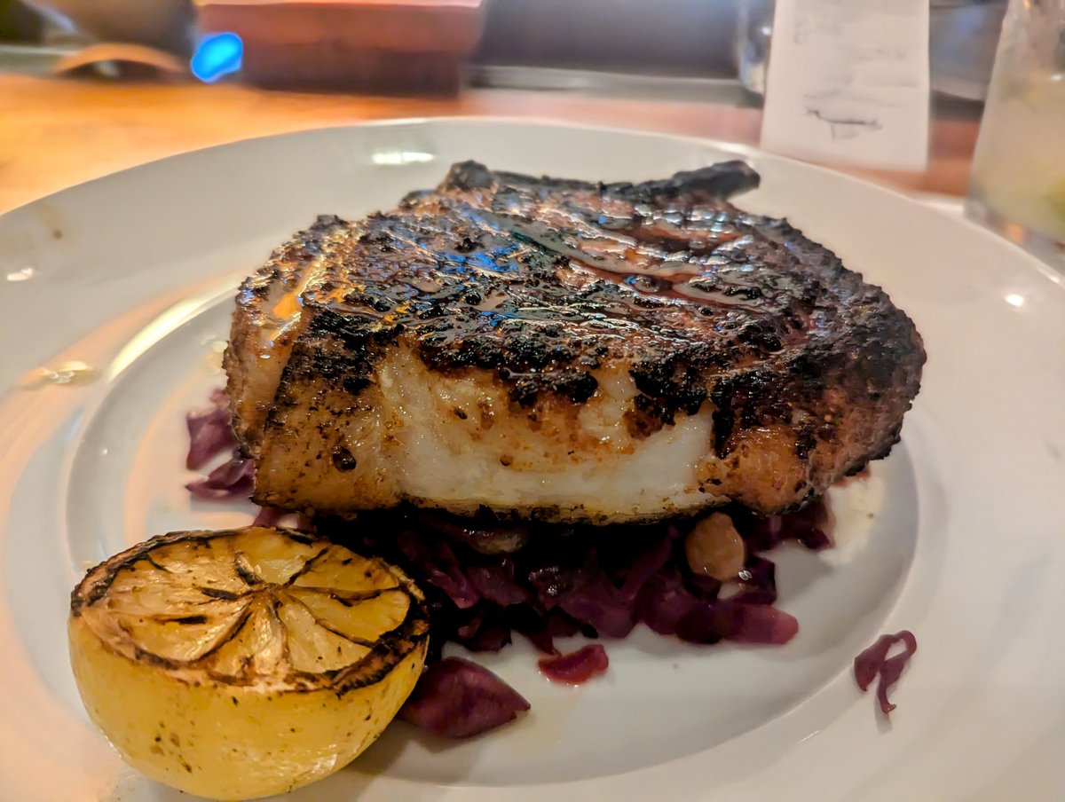 How about a double thick pork chop on a bed of red cabbage?

I had this in Costa Mesa, California.