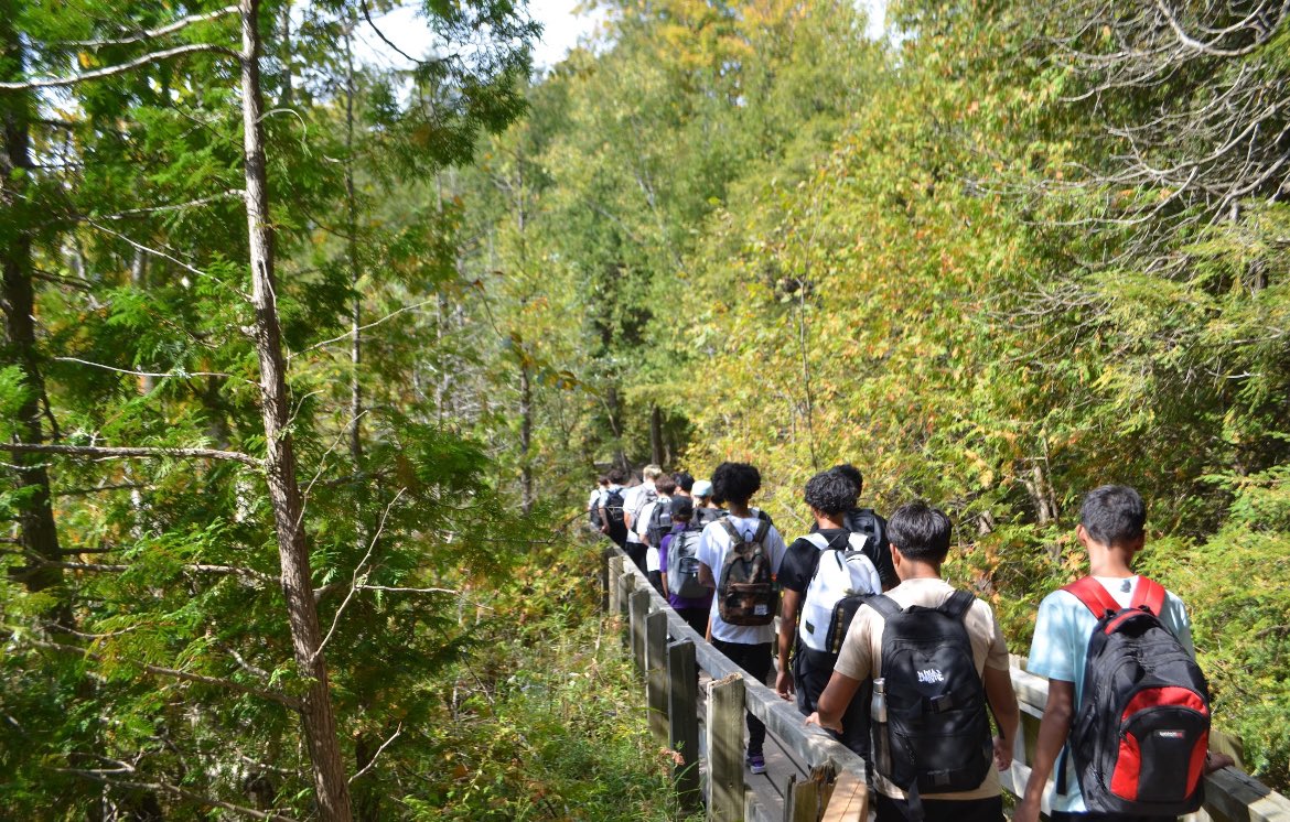 SaintFXTech's tweet photo. Grade 9 steam students take an edu-hike along the escarpment on a beautiful day.  #exploration #biodiversity #IndigenousPeoples @StFXSOS @StFXReps https://t.co/Alslno3btj