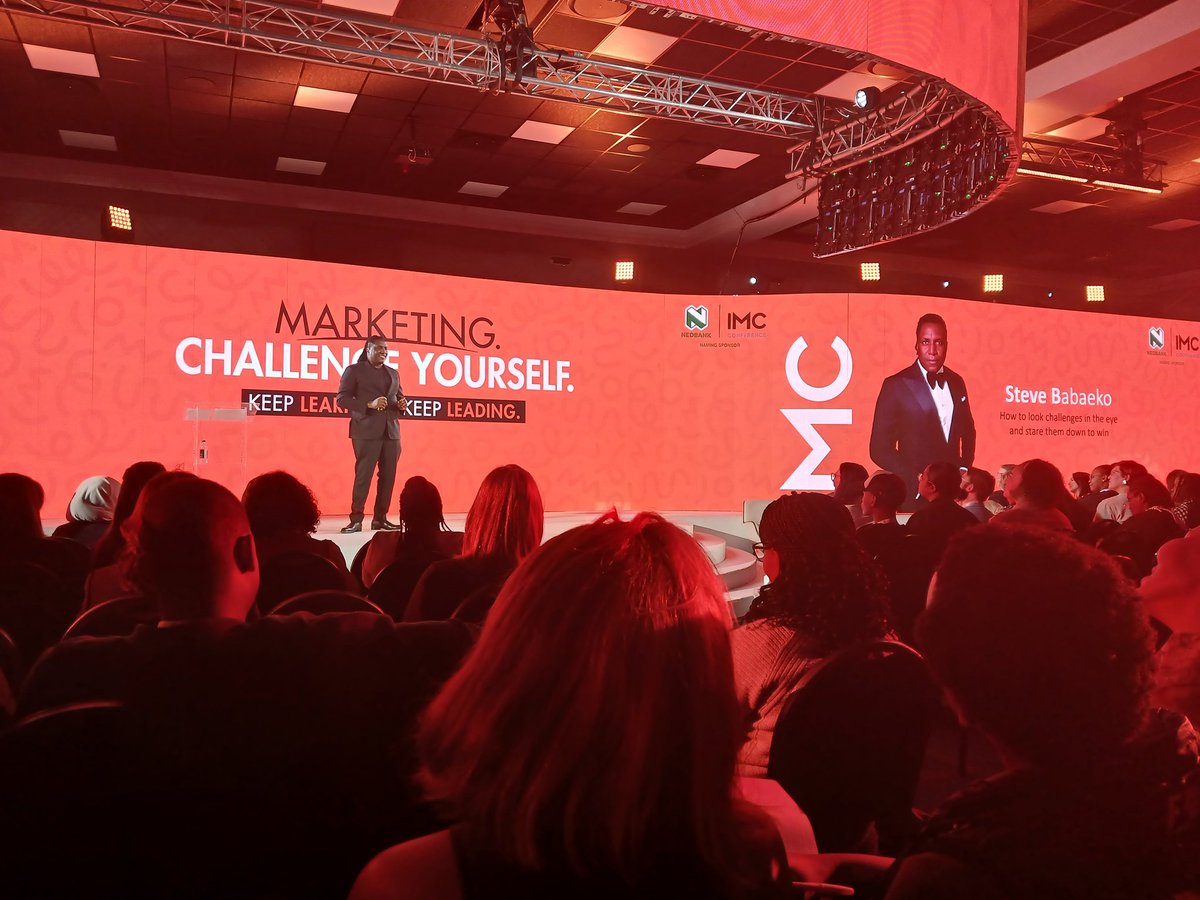 Steve Babaeko opened up by calling for calm between 🇿🇦 + 🇳🇬😅 then shared his inspiring story and gave this beautiful line "for you to win you have to be determined to win" #ChallengeLearnLead #NedbankIMC2024
