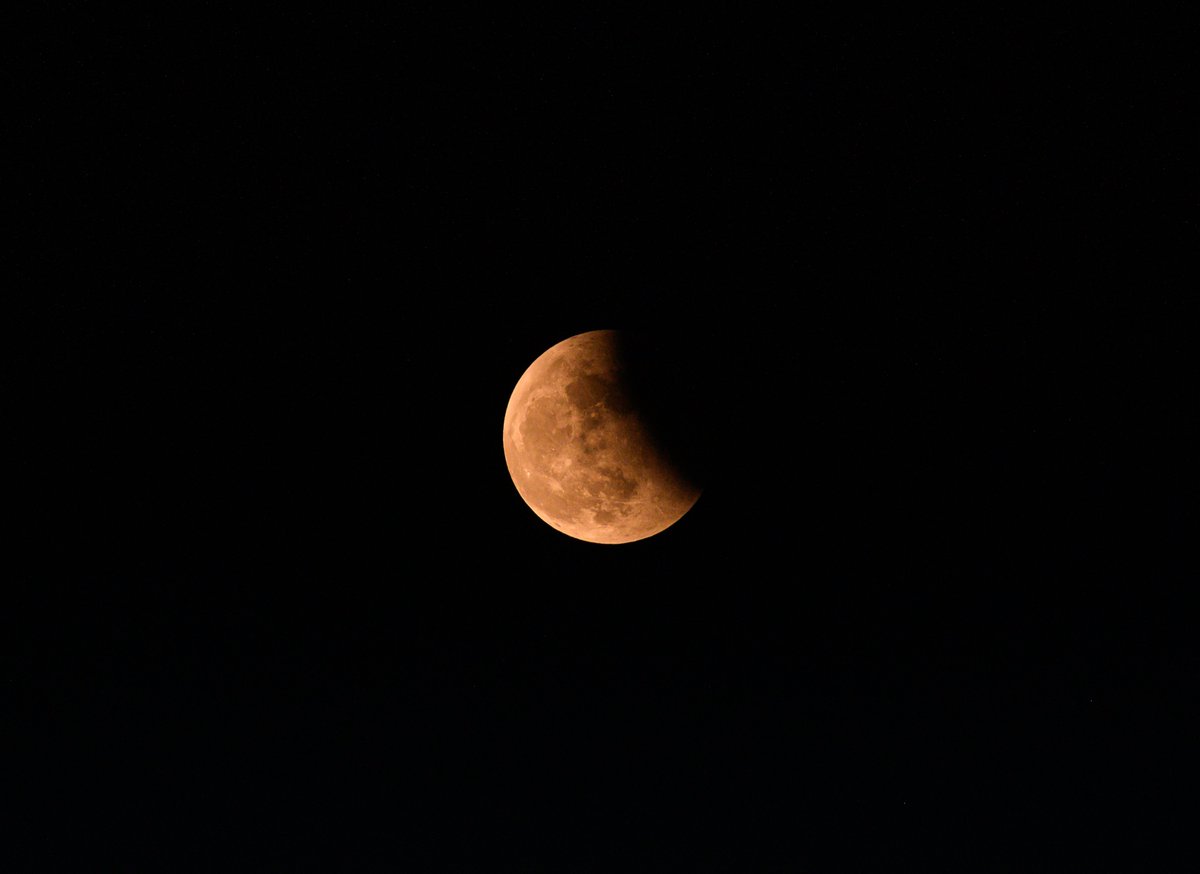 Canada's tweet image. This #CelestialEvent occurs when the Earth is positioned between the Sun and a certain natural satellite but the Earth’s alignment isn’t exact. Unlike its counterpart, it can be viewed without eye protection. Drop your guesses below!⬇️