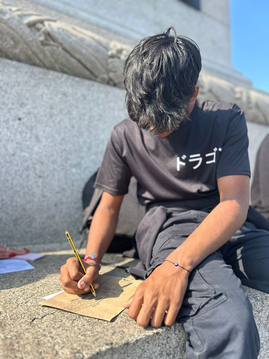 Year 11 Art &amp; Design students enjoying sketching in the sun in Trafalgar Square