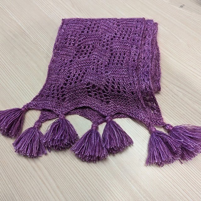 This is how bgreyt on Ravelry.com described her experience with working the Brickwork scarf pattern: “I haven’t done much lace stitch, so I think it was a good introduction to an open pattern. I’m really happy how it turned out.”
Yarn: Handmaiden Fine Yarn Maidenhair
