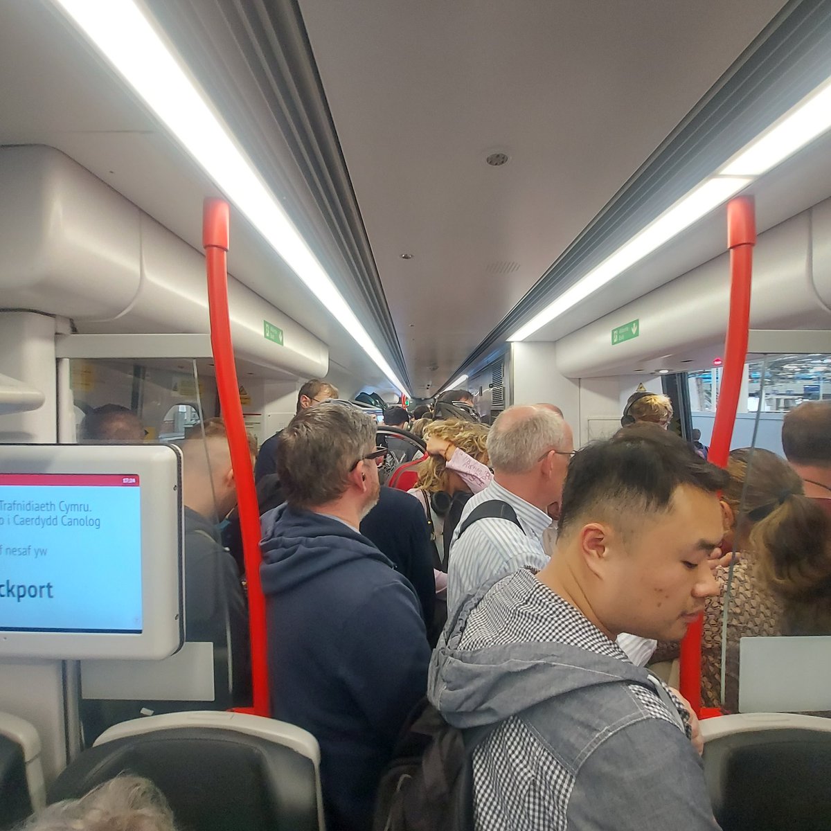 MeganRowe12's tweet photo. @tfwrail still 10 minutes till this train leave from Manchester to Cardiff and already absolutely packed with no room for people to get on. An absolutely awful service for PAYING passengers. https://t.co/UnRV0cjmWU