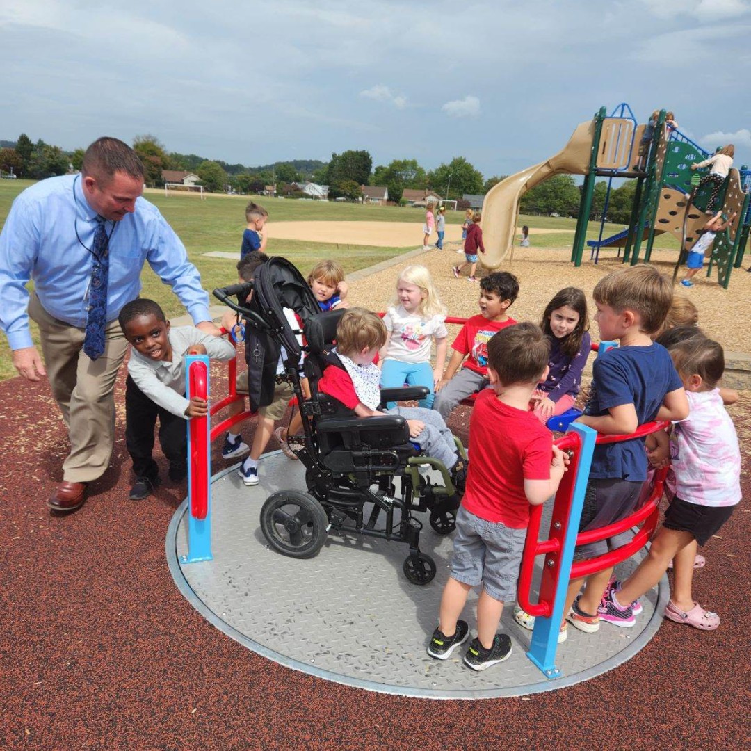 WilsonSchlDist's tweet photo. Yesterday, Dr. Trickett got to enjoy some recess time with Whitfield students on the adaptive playground! #WilsonSD #AdaptivePlayground https://t.co/XHn0YKf2yS