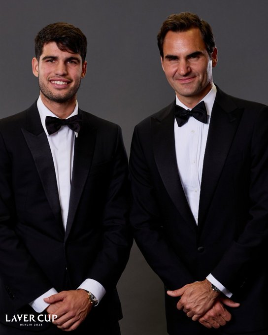 Carlos Alcaraz and Roger Federer poses on the black carpet at the Opening Night Gala of Laver Cup Berlin 2024.