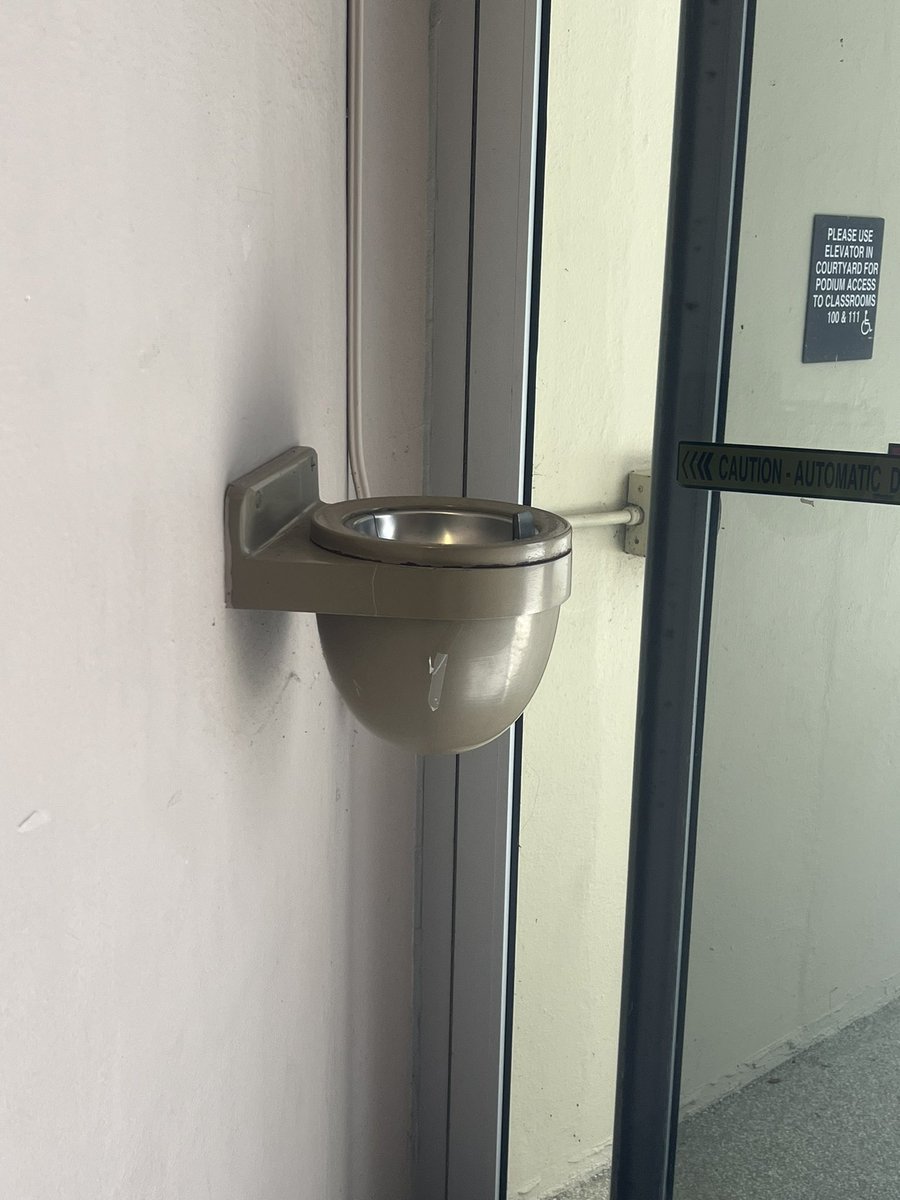 A snapshot in time. This artifact is still attached to the wall in the Chemistry building. Wonder what the students think it is.