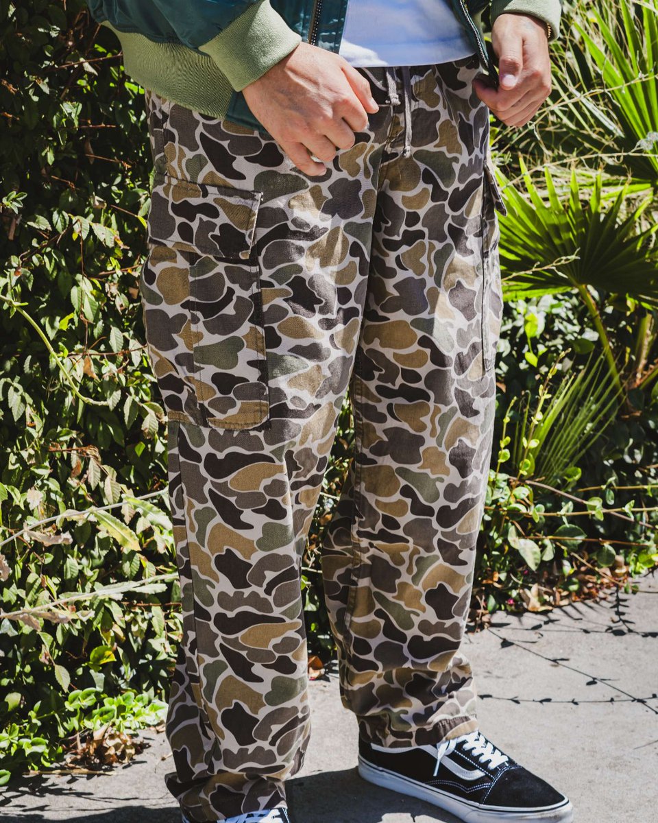 Karmaloop's tweet image. Blend in but stand out. Vans camo cargos on deck. 🪖 

Shop #Vans on the Karmaloop App 📲

#VansStyle #VansLife #VansCulture #CamoCool #Essentials #StayFresh #CamoVibes #VansDrip #StreetReady