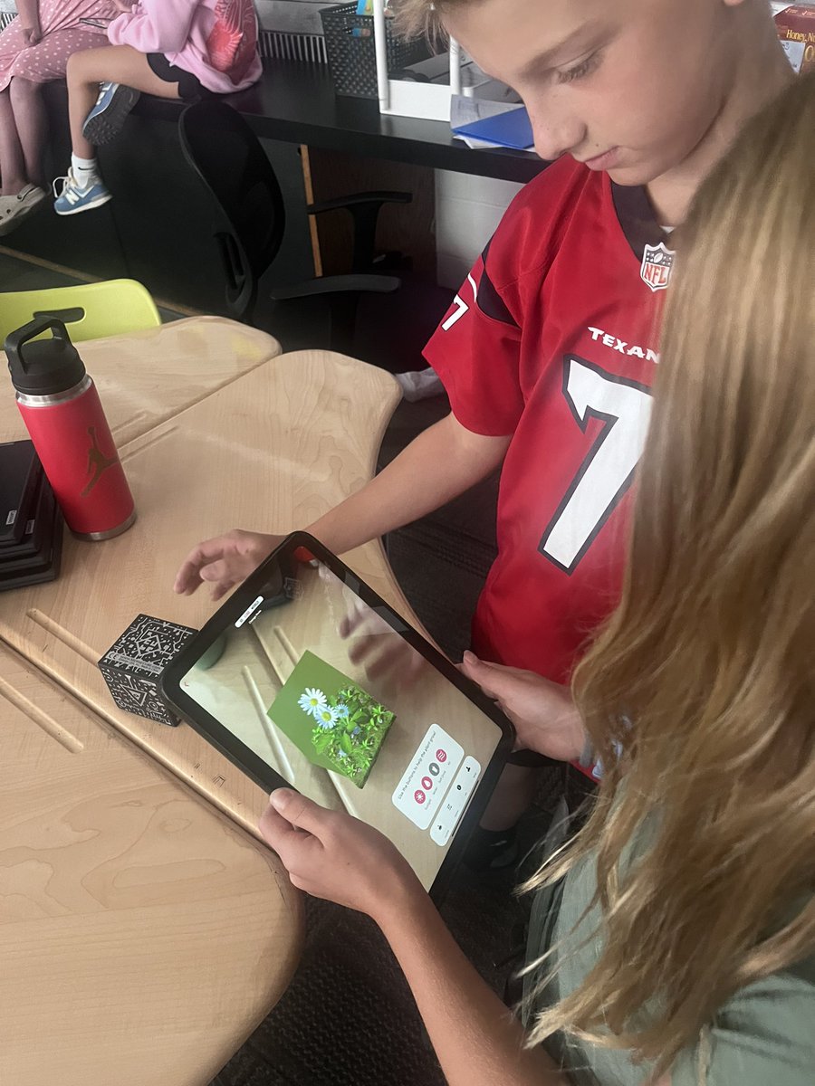 Today we explored merge cubes in connection to our food web learning! #vanmeter