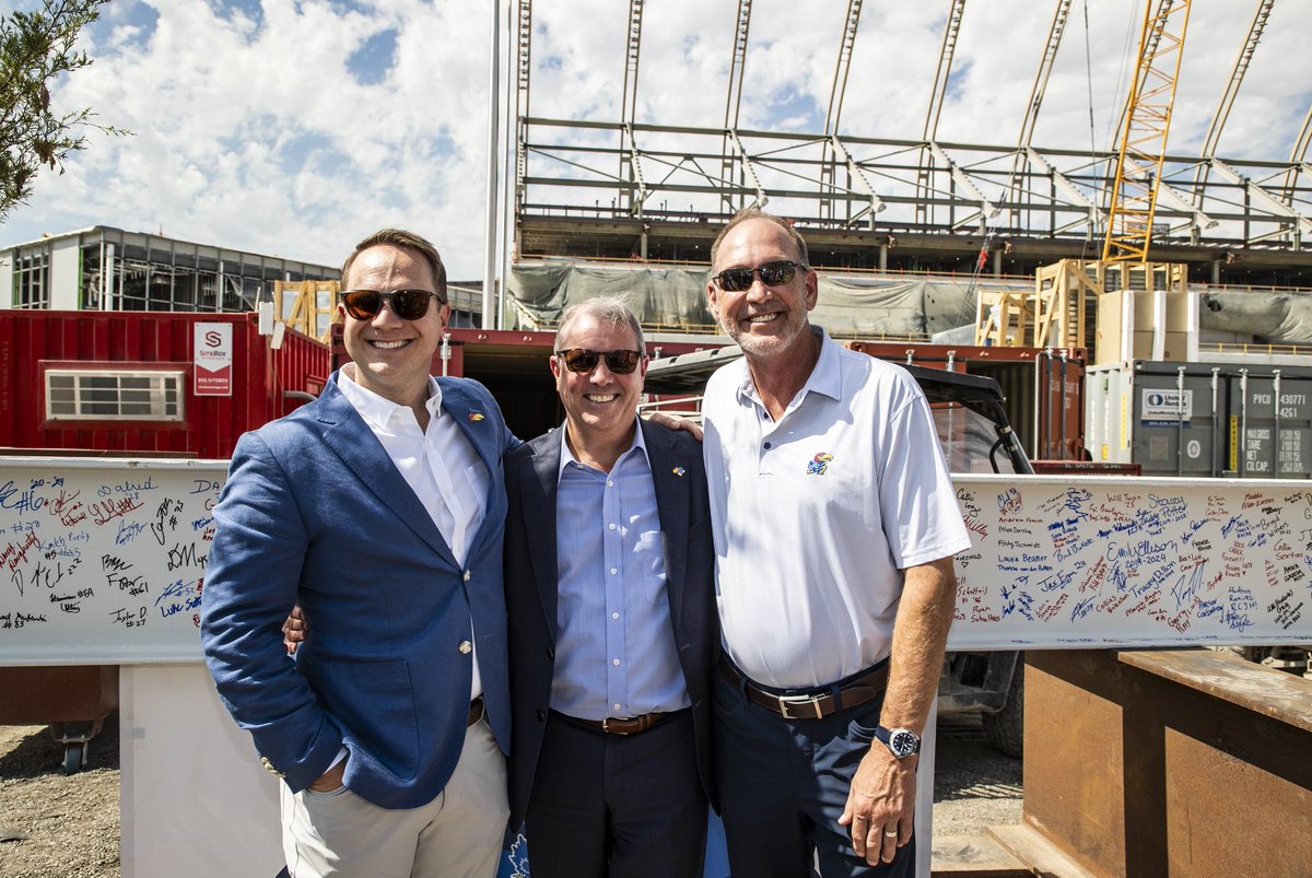 KUAthletics's tweet photo. To the stars 🏗️📈

The final steel beam in the opening phase of reimagined David Booth Kansas Memorial Stadium is signed and in place! https://t.co/uUa6b5h72n