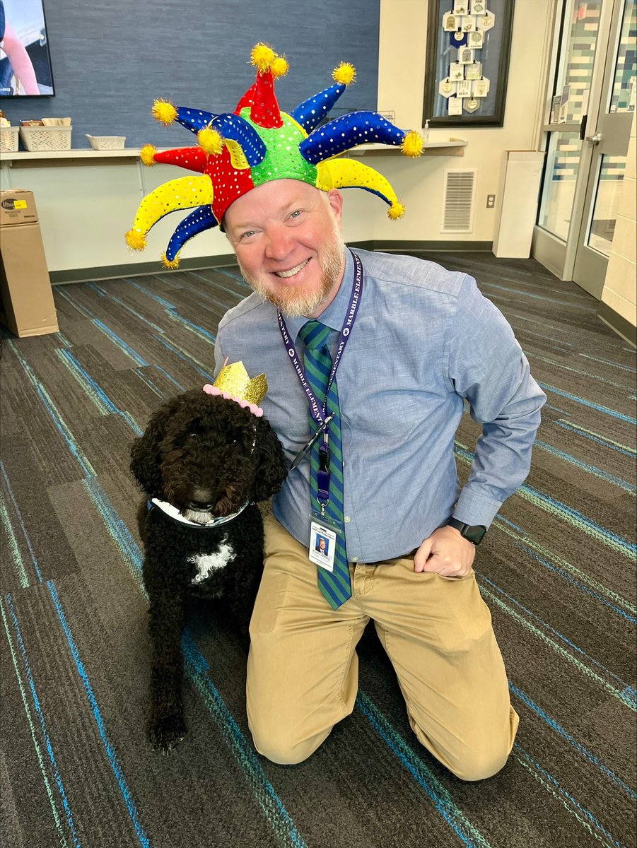 eastlansingps's tweet photo. Queen Mel the Marble Pup and her Jester Principal Robertson on Hat Day for HOCO Spirit Week! https://t.co/nBNjDS4M7C