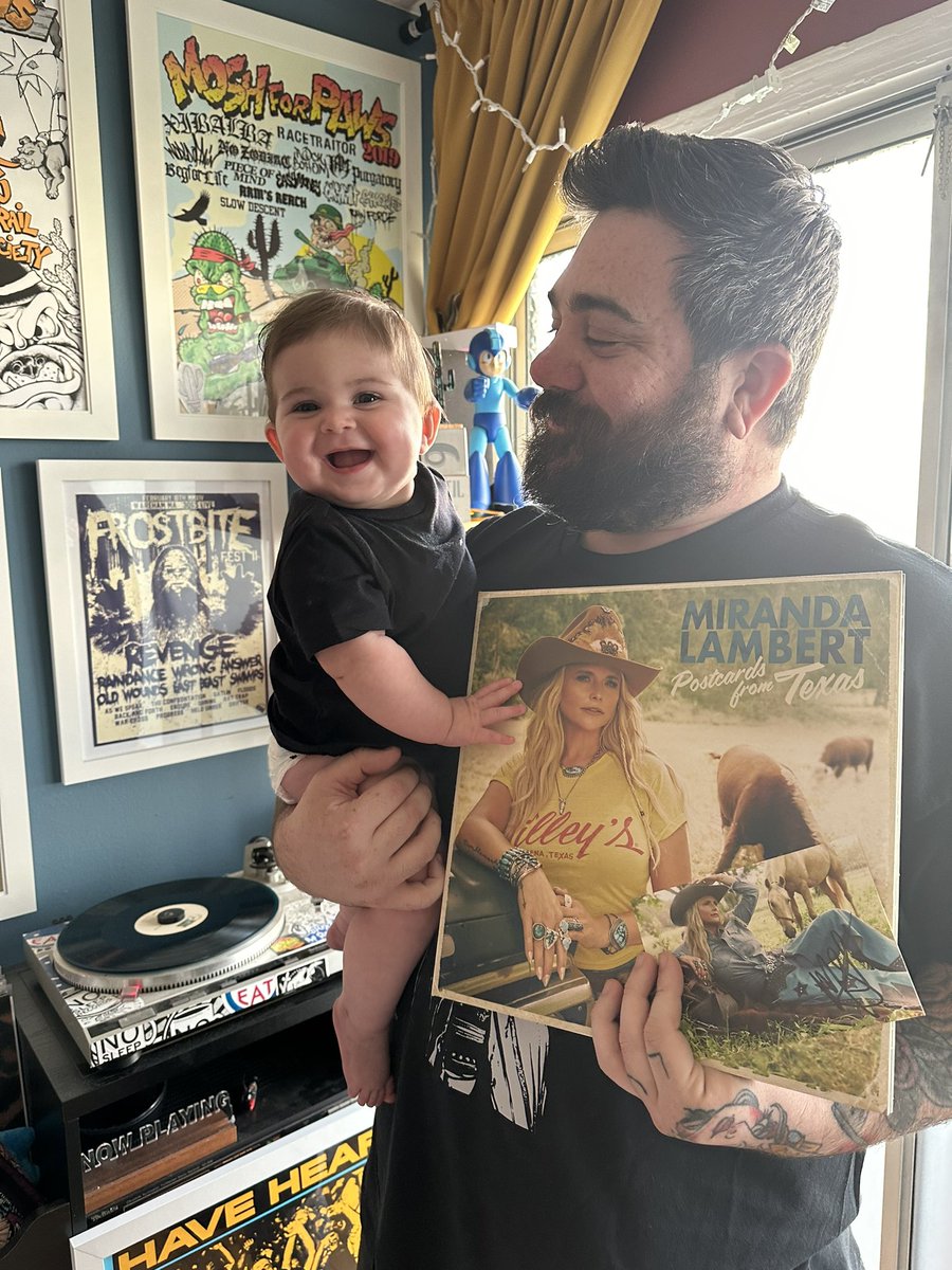 TaylorLoining's tweet photo. My angel of a husband got me a SIGNED vinyl of @mirandalambert ‘s new album and it safe to say Luna is ECSTATIC listening to her favorite 🥰 https://t.co/O0yvaEMK4S