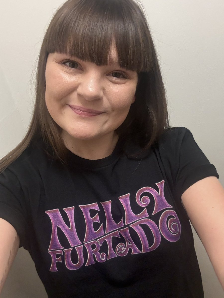 NannaMMoller's tweet photo. Of course I am wearing a @NellyFurtado shirt today because 7️⃣ has finally been released!!!! 🥳🔥🥳🔥🥳🔥 - Don’t mind my tired face, I have been up since 5 am 😅 #NF7 https://t.co/kabsgQTJDq