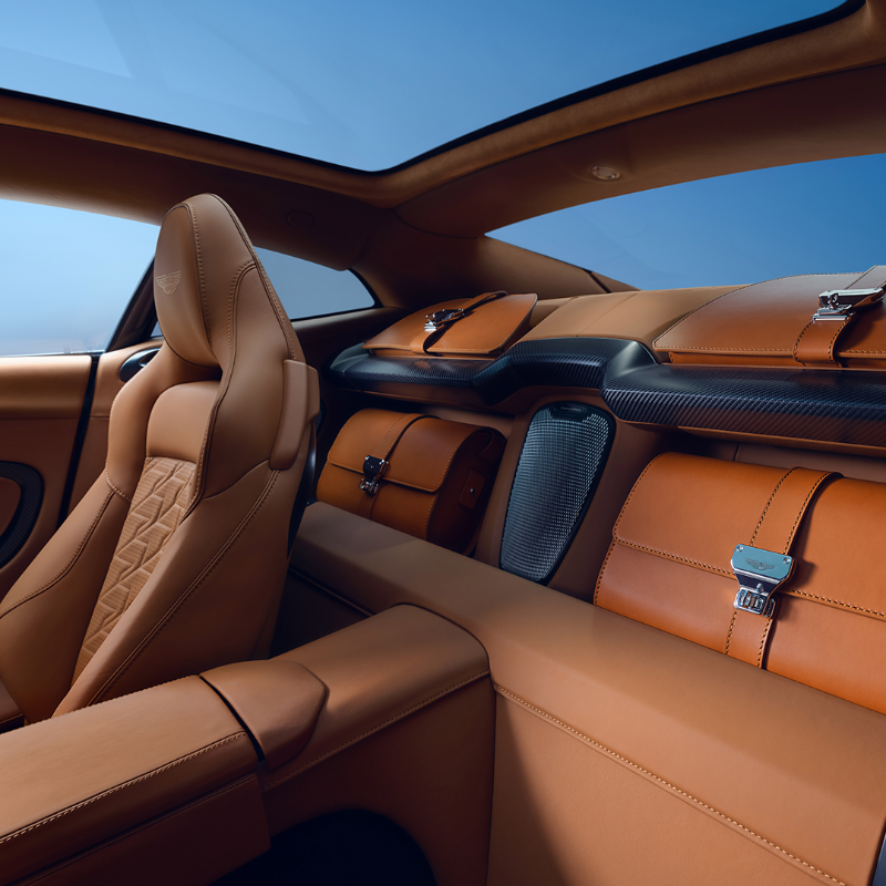 astonmartin's tweet photo. Vanquish’s unique 2-seat cabin is a sanctuary of elegance. The luggage area behind the seats, adorned with carbon fibre, leather and aluminium.

#AstonMartin #VeniVidiVanquish #ZENITHDRIVEN