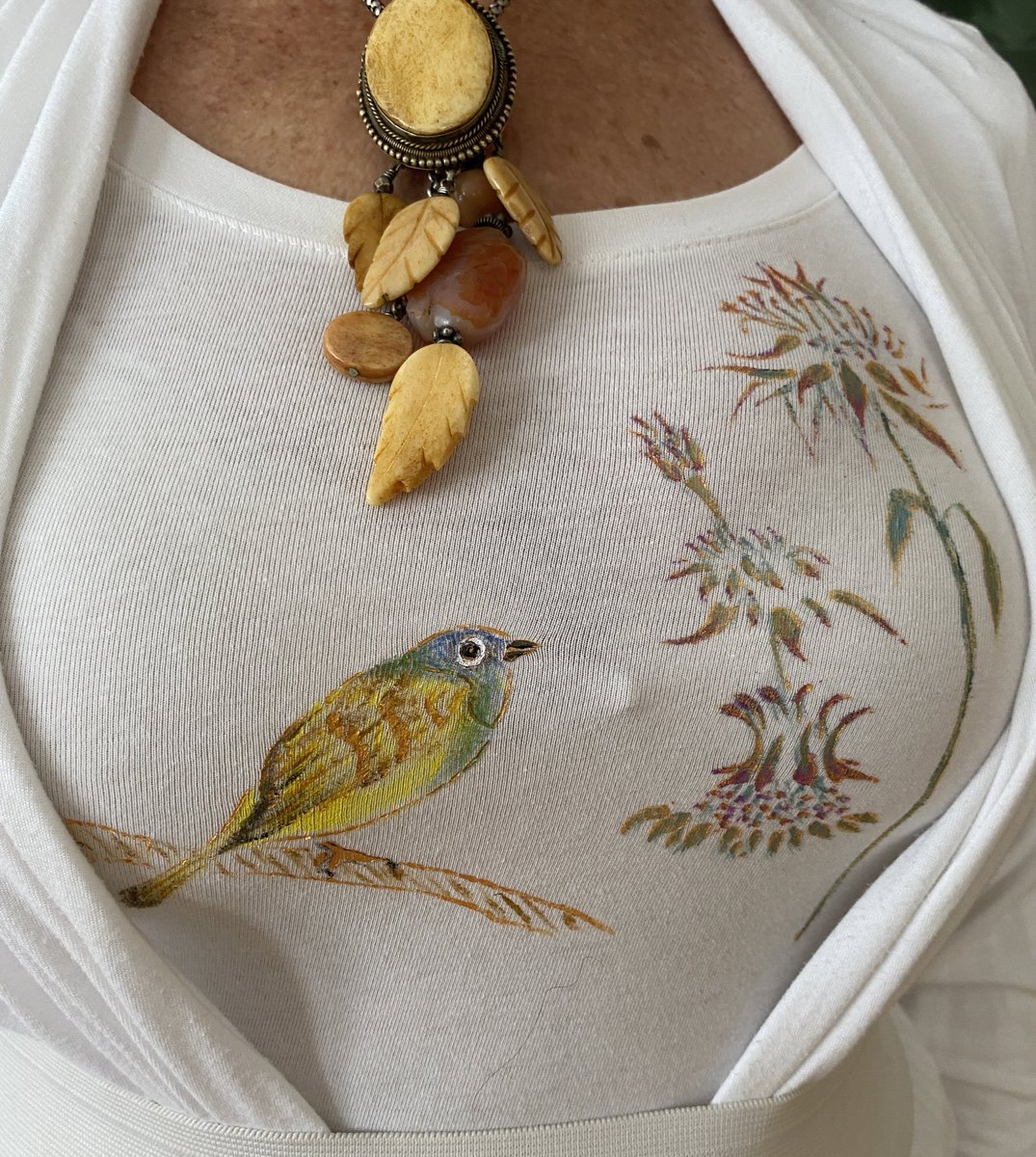 clarecooley's tweet photo. “Warbler &amp; Wildflower” art I turned into a stencil and painted onto a shirt, “Art 2 Wear.” 💛 https://t.co/mPChRukAVX