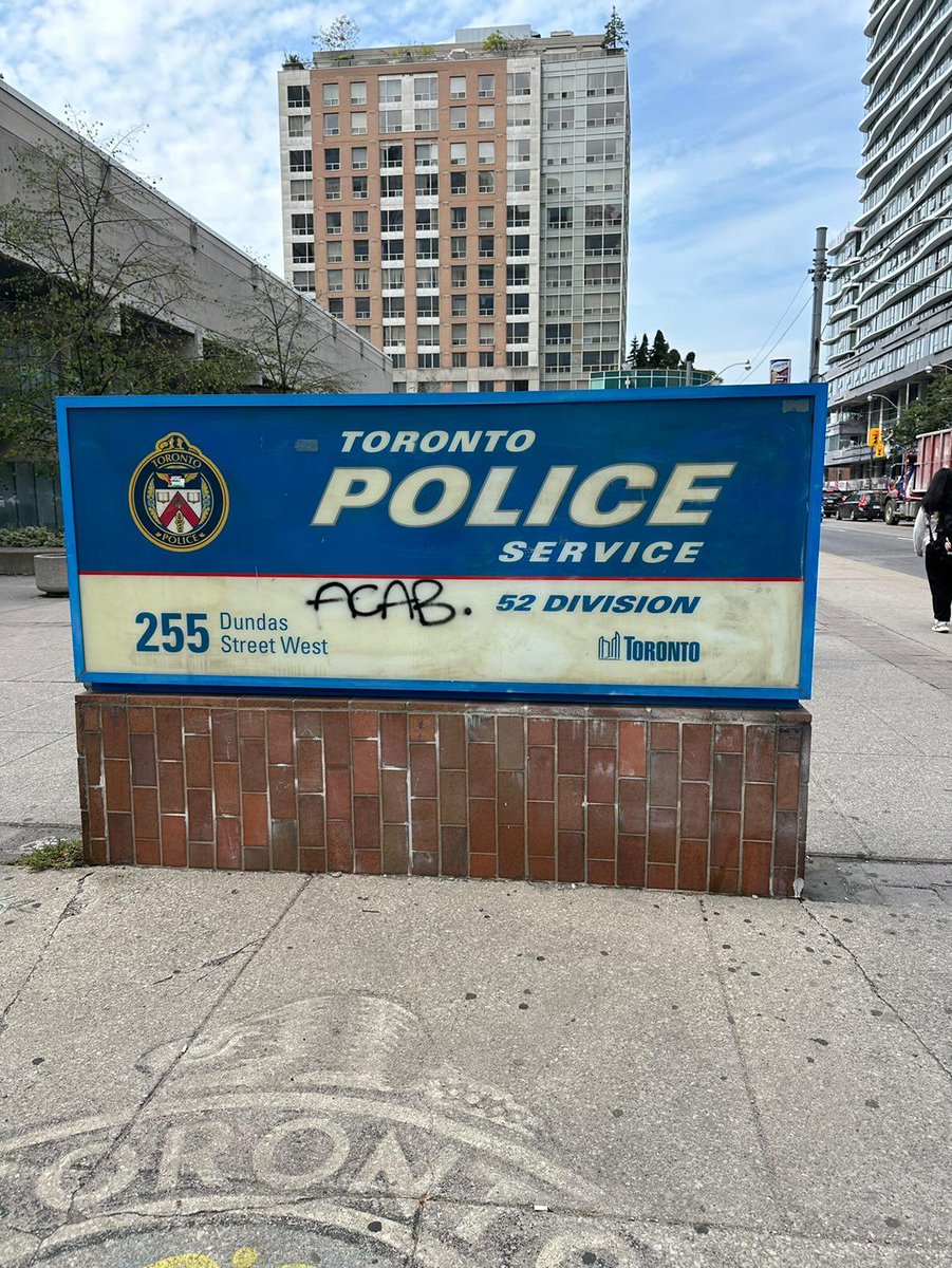 ACAB spotted on a cop sign in Toronto, Ontario