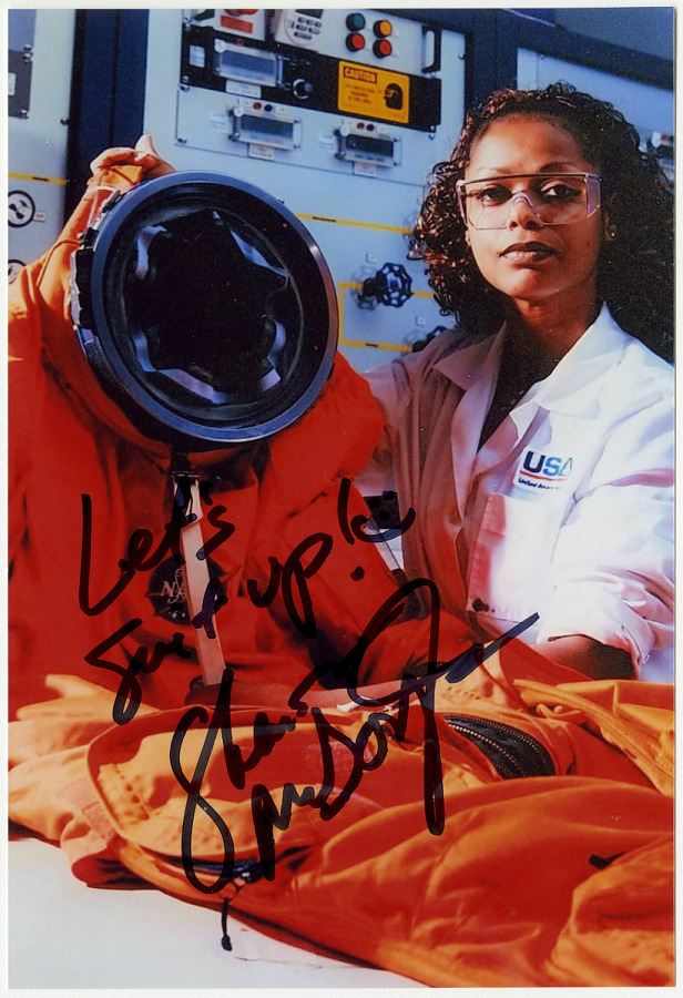 Sharon McDougle was Mae Jemison's spacesuit technician on the STS-47 mission. McDougle made history as the first Black woman to work as a spacesuit technician, crew chief, and manager of the Space Shuttle Crew Escape Equipment Processing department.