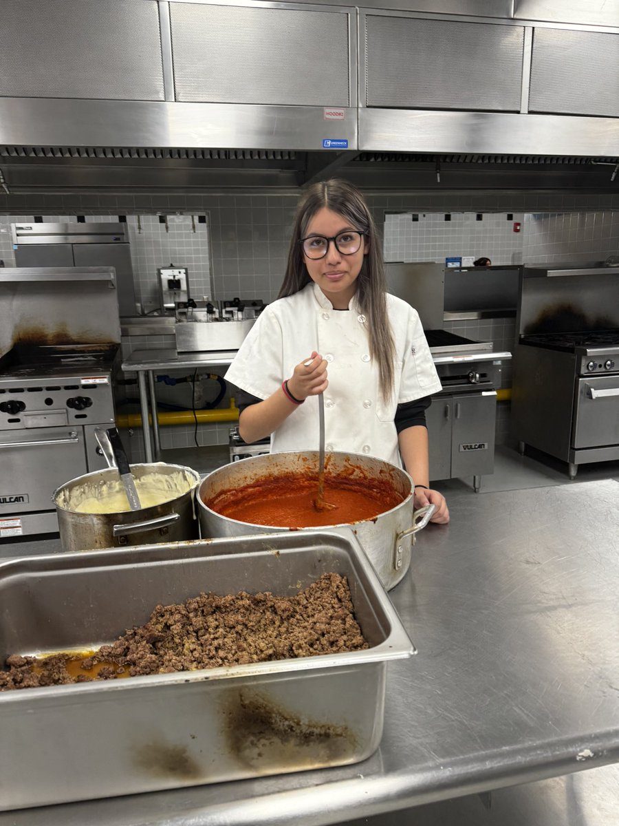 HHSCulinaryArt's tweet photo. Our kids working hard to prepare the pregame meal for @Horizon_FB Special shout out to our Senior Chef Joaquin Lopez for creating the menu.Lasagna with handmade pasta,marinara,and bechamel sauce.They stayed after school to serve the coaches and players.Good luck boys.Go Scorpion https://t.co/WnEWl73iLd