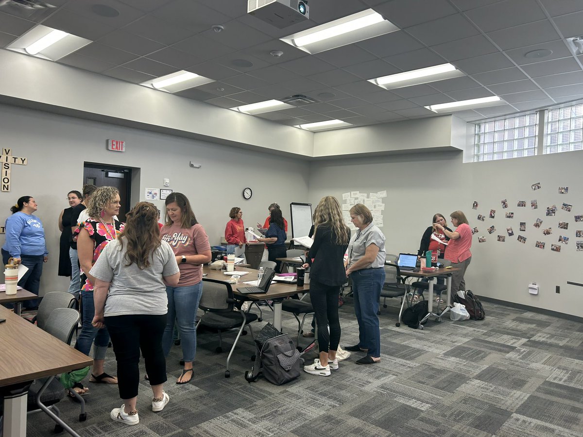 Title reading and math teachers hard at work today! Team building with a paper tower challenge and lots of collaboration, especially about how to support core instruction. <a href="/olatheschools/">Olathe Public Schools</a> <a href="/DrLizHarrison/">Liz Harrison</a> #opsmaketodaycount
