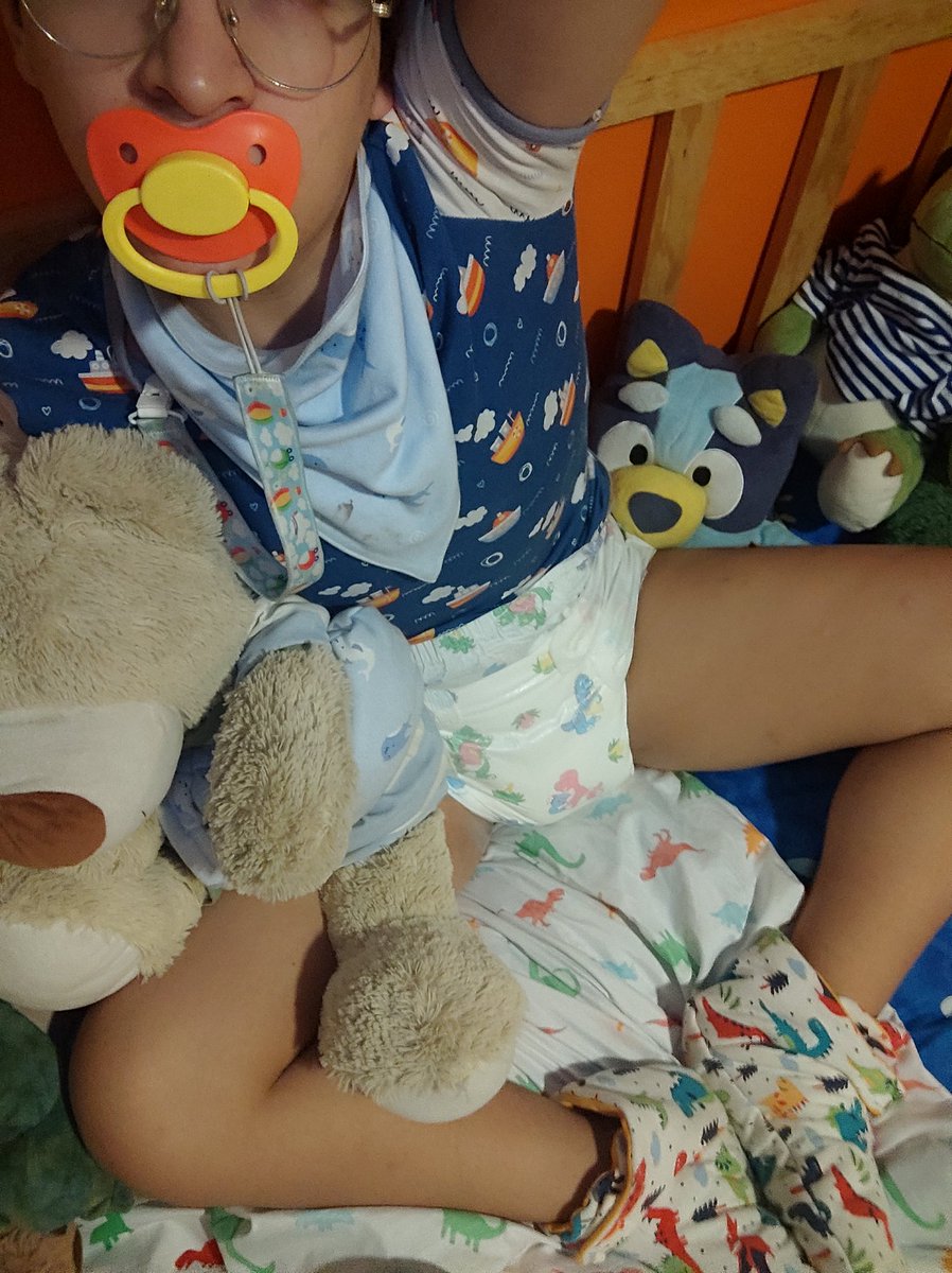 "After my bath, Daddy changed me for bed. My dinosaurs will protect me from monsters and from wetting the bed."