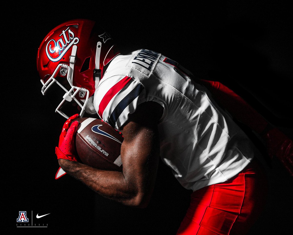 UNISWAG's tweet photo. The red "Cats" script helmet makes its debut this Friday for @ArizonaFBall 

#uniswag https://t.co/1HoRnBy4mM