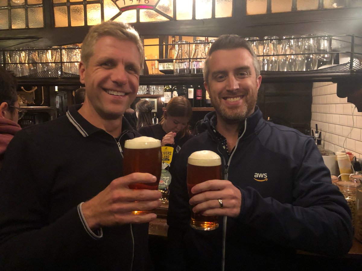 A very happy 5 years of ⁦<a href="/awscloud/">Amazon Web Services</a>⁩ to the incredibly talented ⁦<a href="/julian_wood/">Julian Wood</a>⁩!!! Here the much younger us shared a pint on his first Day 1🍻
