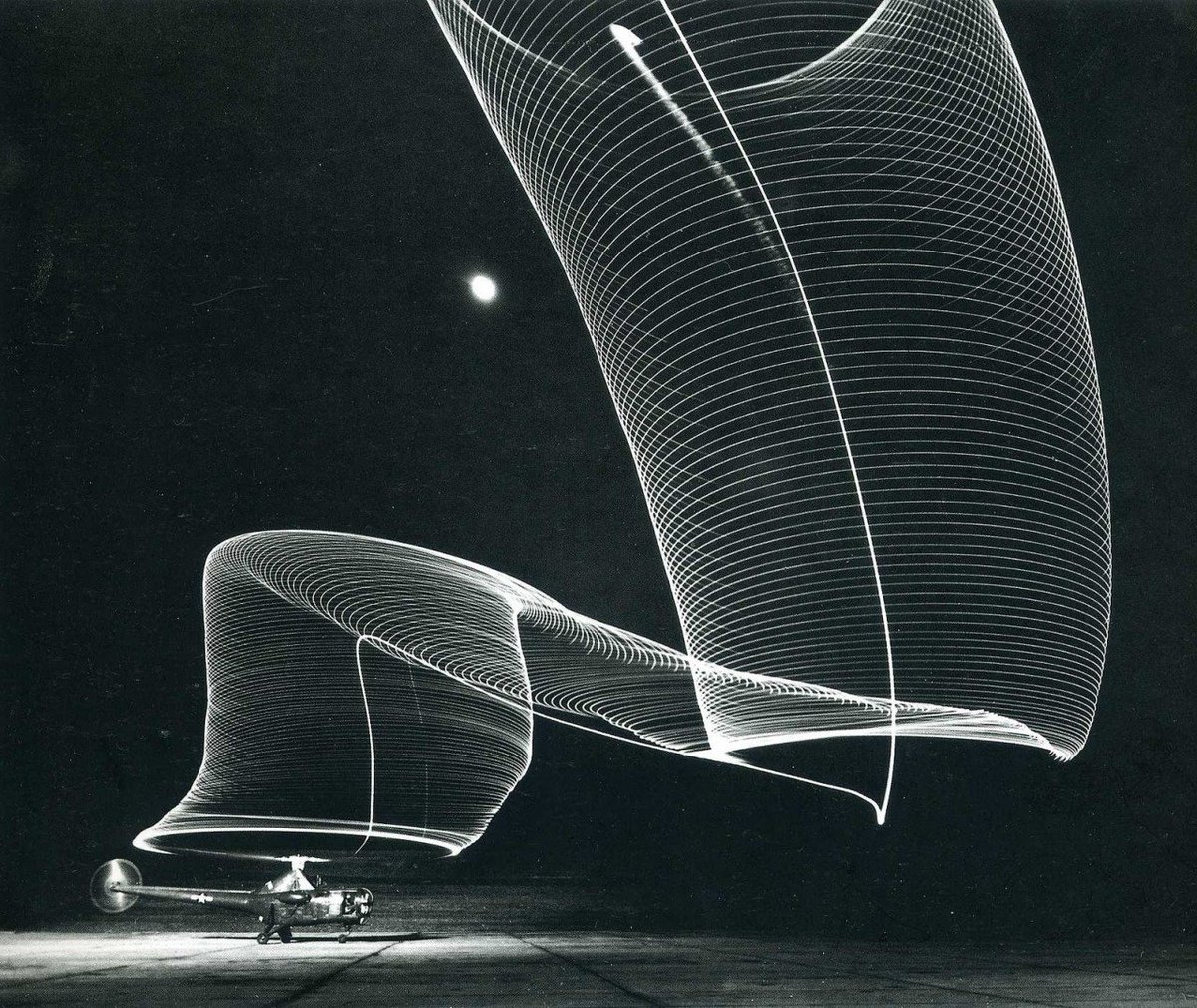 phalascist's tweet image. helicopter taking off at night, andreas feininger, 1949.
