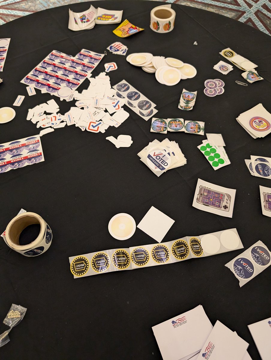 awedmore's tweet image. At the Election Center conference and what do I spy? Some cool "I Voted" stickers on display from @jcauditor