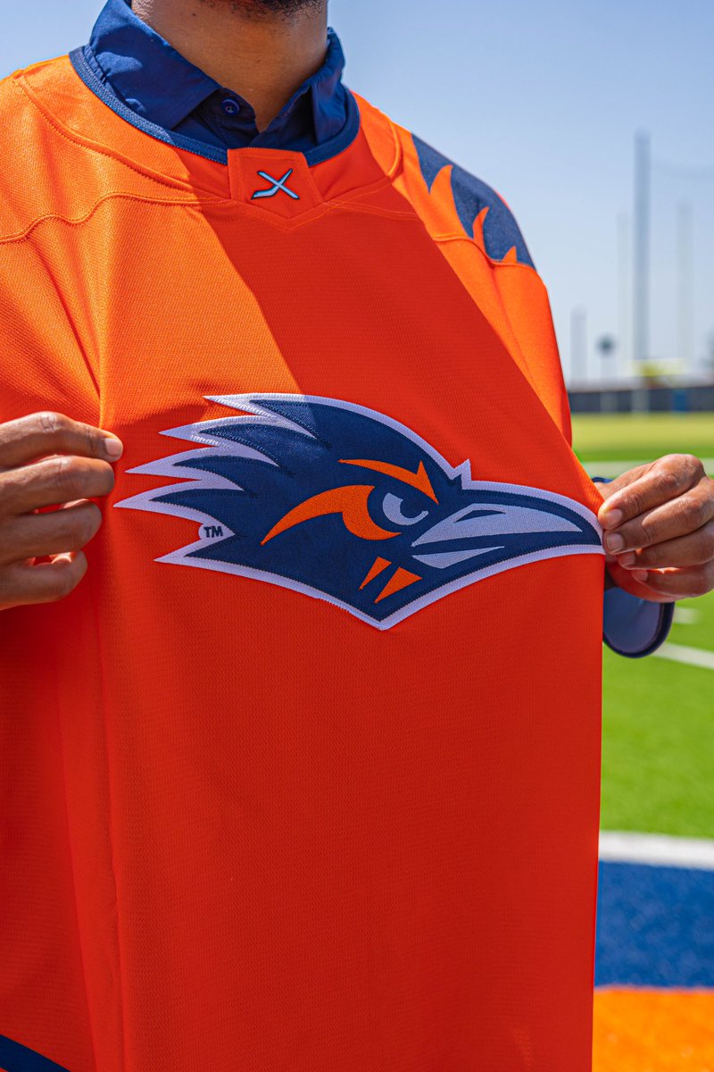 birdsuphockey's tweet photo. 🚨 Big news, Roadrunners! Our official UTSA Hockey merch store is now LIVE! 🏒🔥 

Get your jerseys, sweaters, and more to rep the team in style. Show off your Roadrunner pride! 🧡💙 

Shop now via the link in our bio!

#utsahockey #achahockey #birdsup https://t.co/V7k0QbL1wK